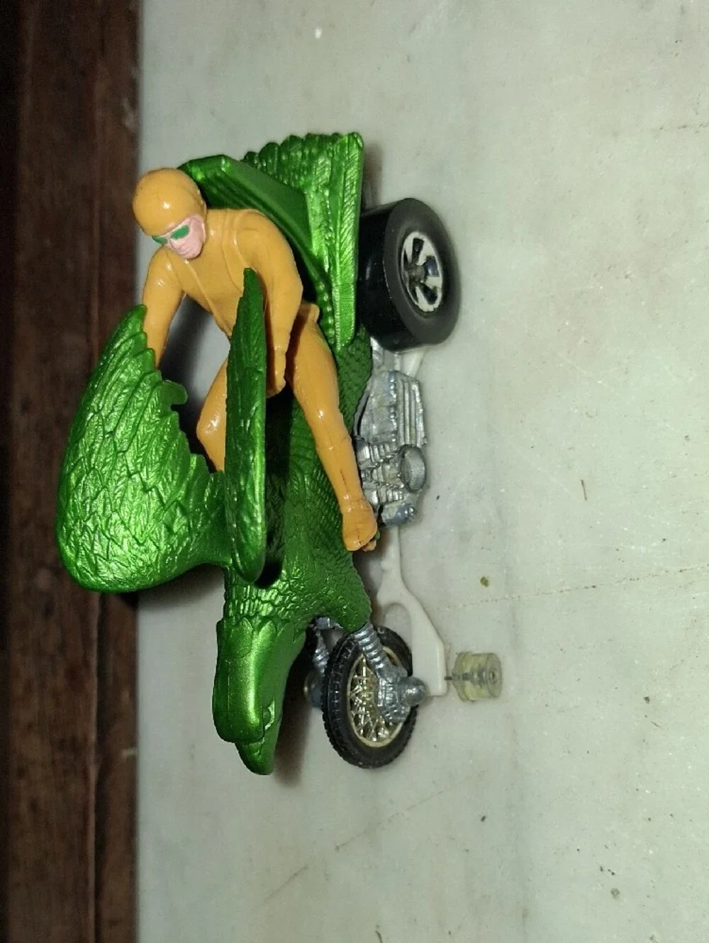 Vintage 1970s Hotwheels Metallic Green Eagle Motorcycle with Yellow Rider Figure